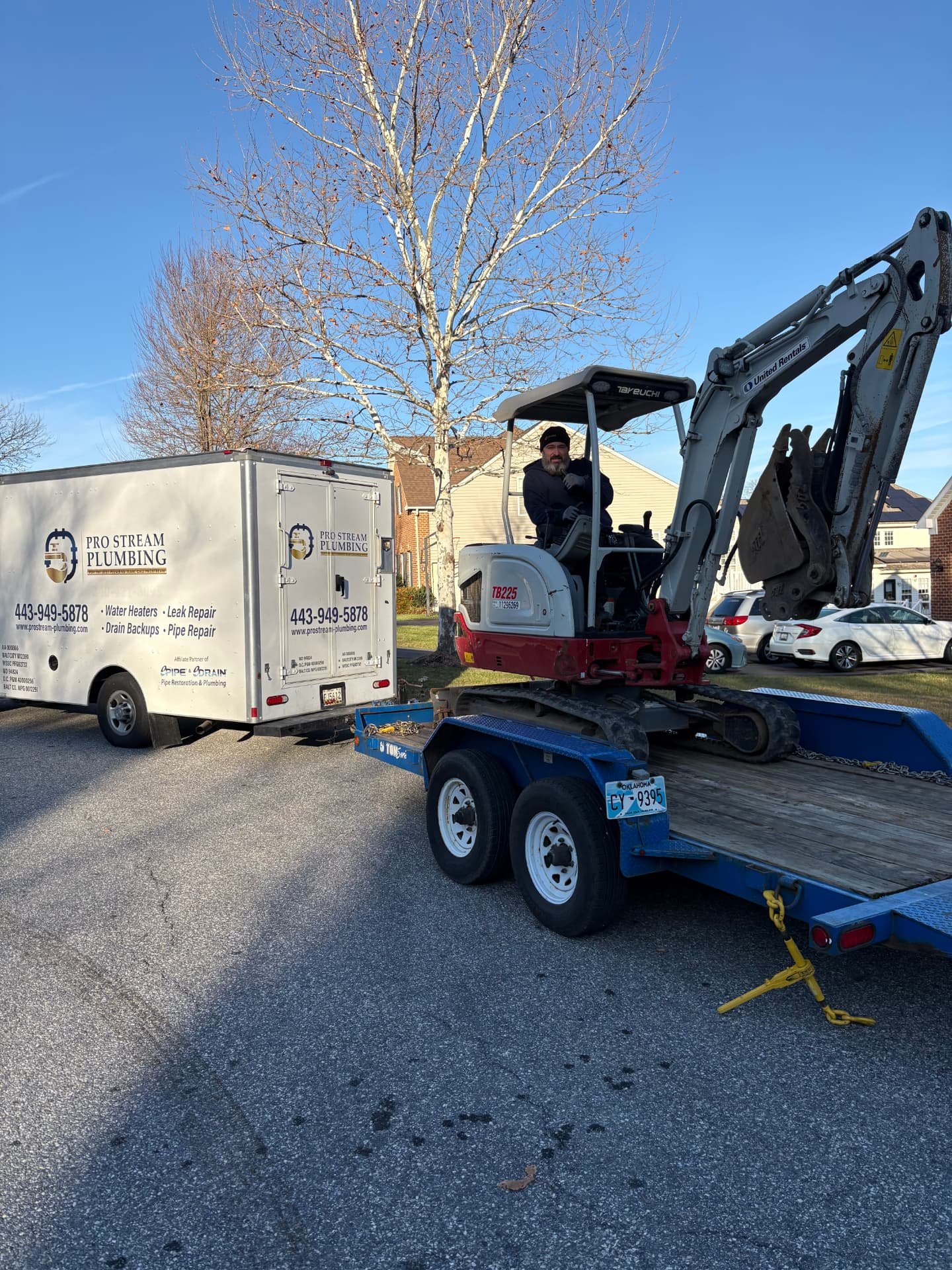 ProStream Plumbing excavation trailer and mini-excavator on a sewer line job in Baltimore, MD — ProStream Plumbing